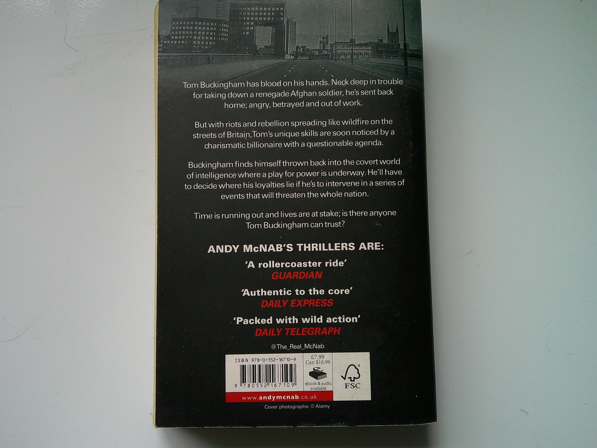 Back cover of Andy McNab The Fortress book showcasing a gripping thriller description
