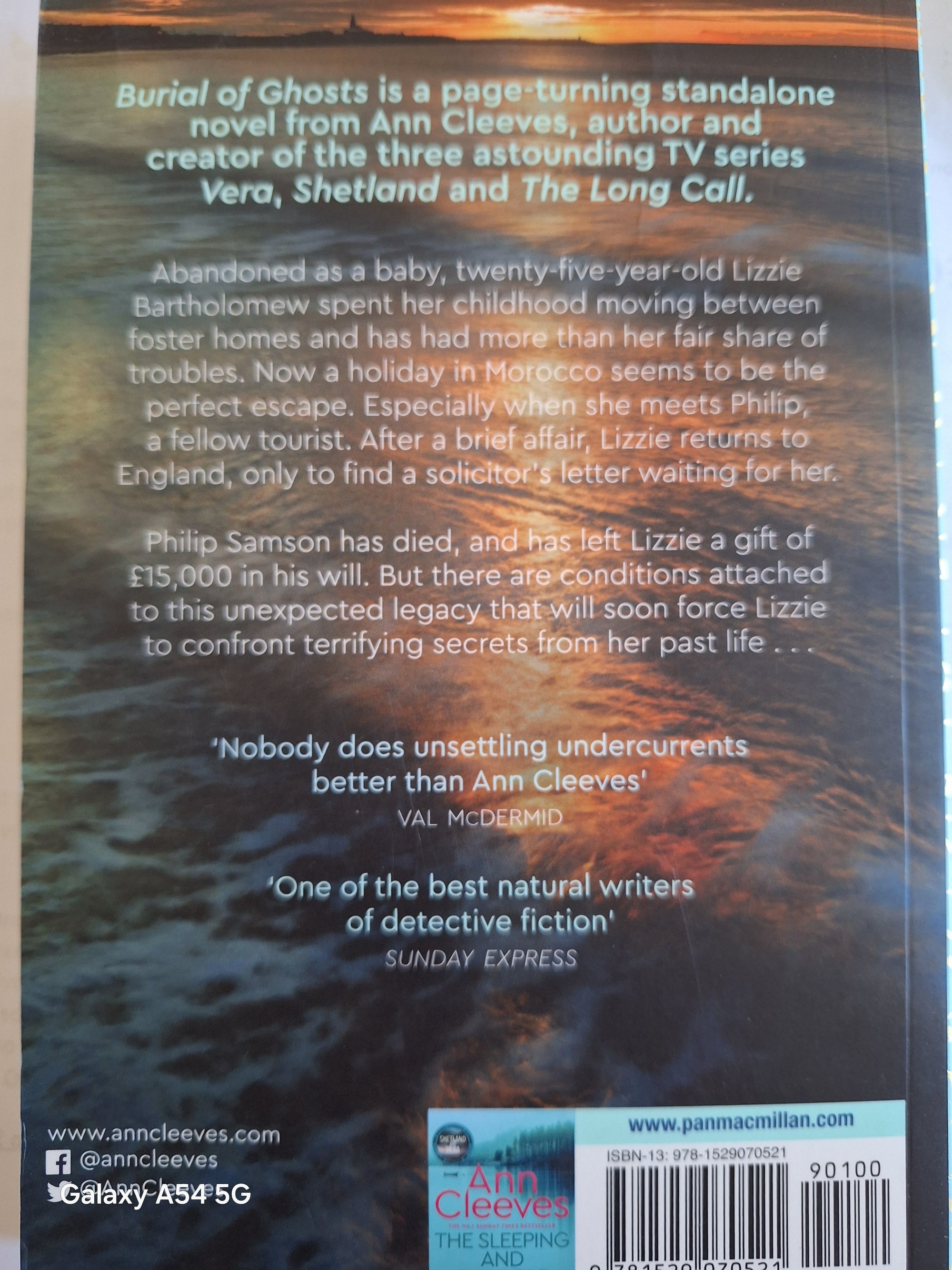 Back cover of Ann Cleeves classic crime books featuring 'Burial of Ghosts' synopsis and author's details