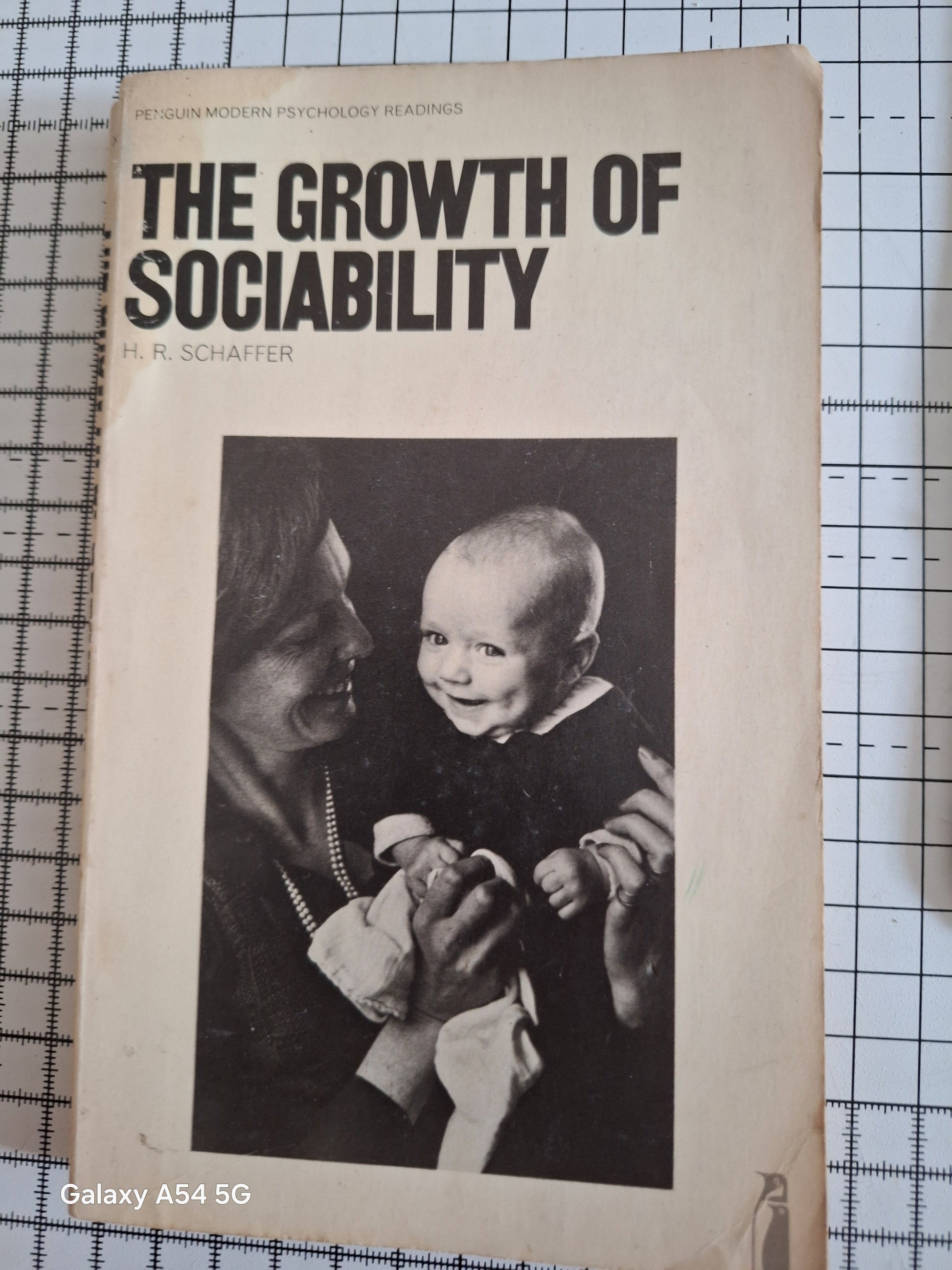 The Growth of Sociability book by H R Schaffer with a black and white cover image of a woman holding a smiling baby