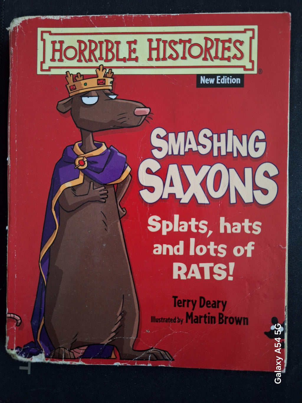 Horrible Histories Smashing Saxons book cover featuring a cartoon rat king with a crown and purple cape