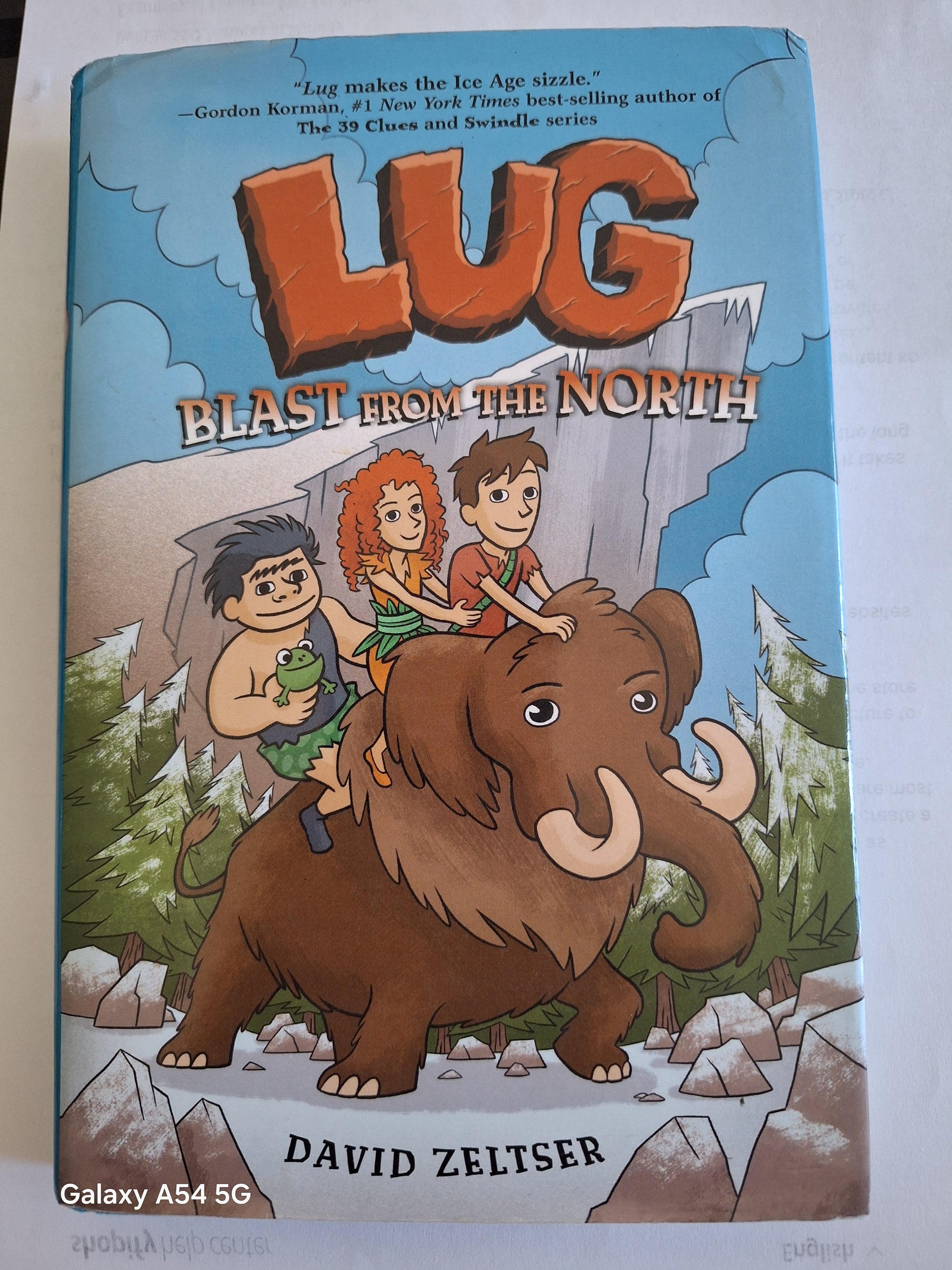 Cover of LUG Blast from the North used book featuring characters riding a mammoth
