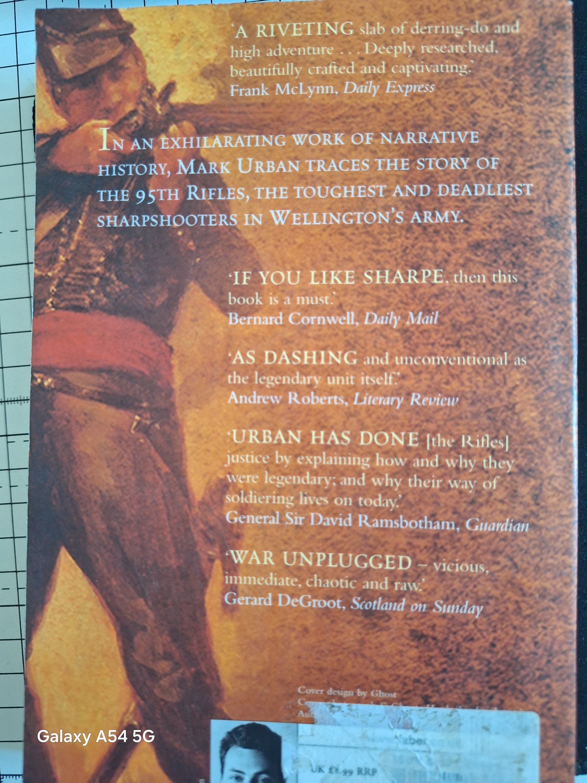 Back cover of a Slightly Read Books edition featuring a detailed description of The Rifles and their history