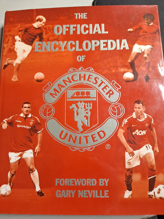 The Official Encyclopedia of Manchester United book with red cover featuring players and club crest