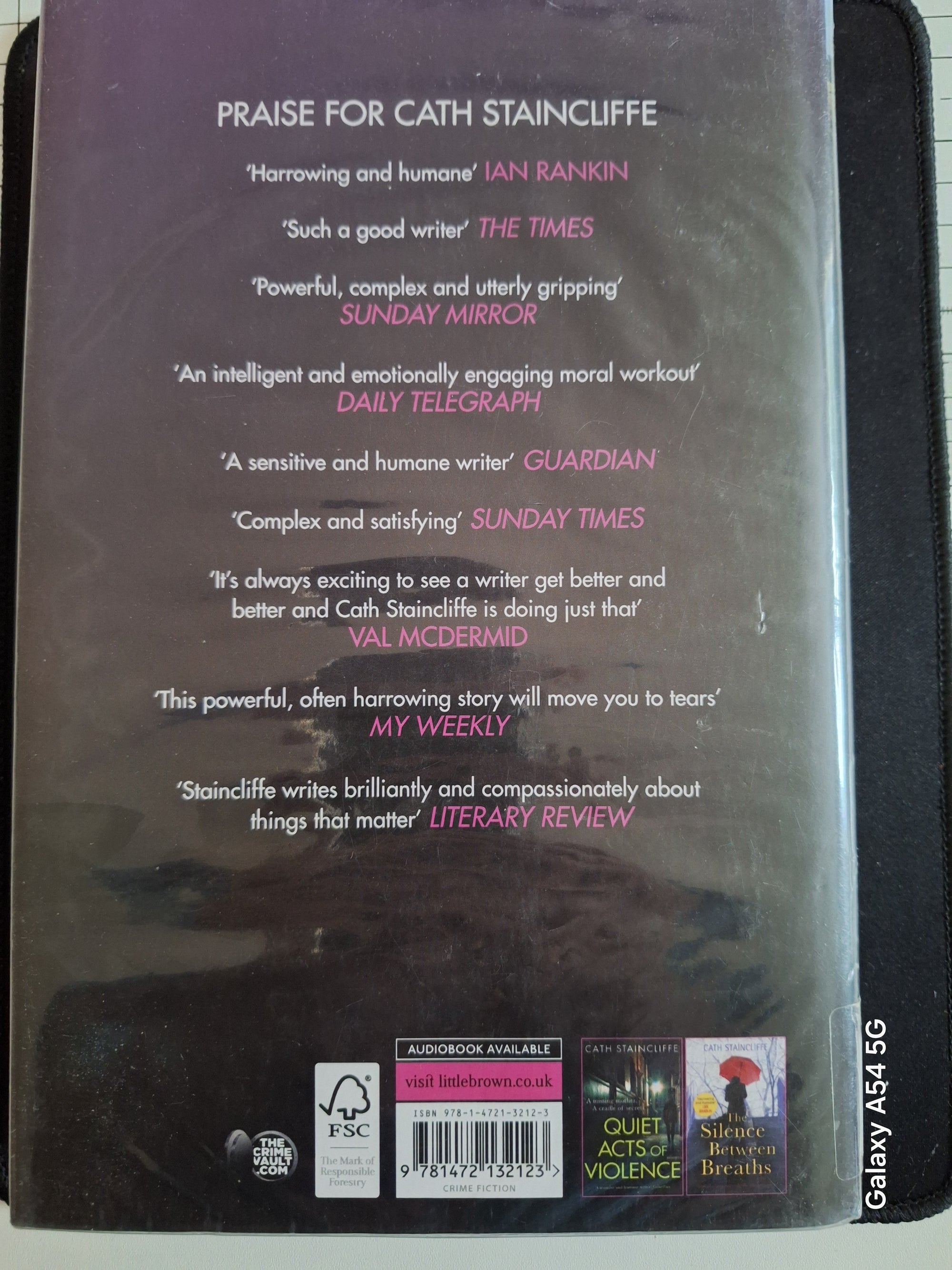 Back cover of Slightly Read Books edition of Running out of road with praise quotes from various reviews