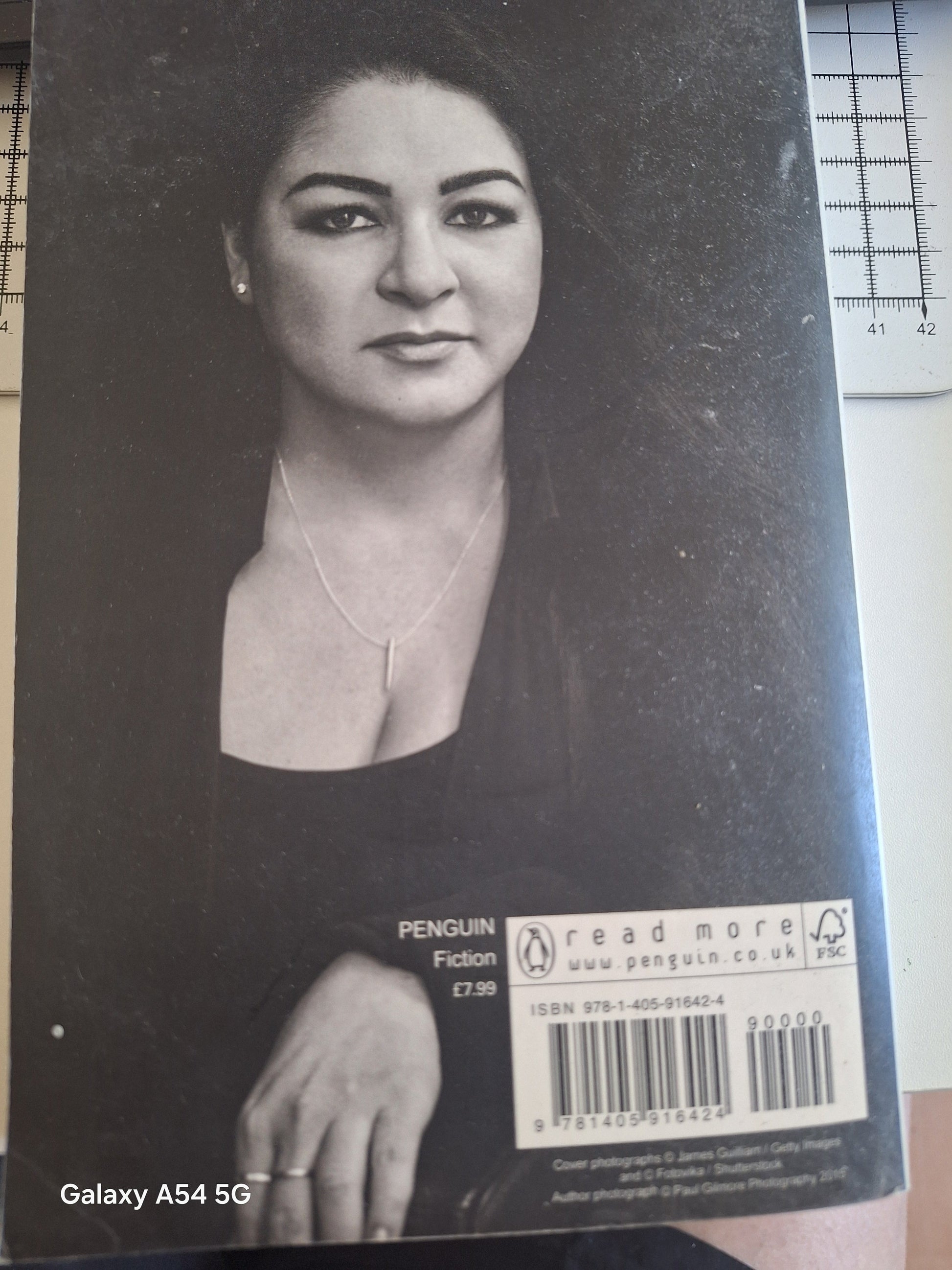 Crossfire series final novel for sale, featuring a striking black and white author portrait on the cover