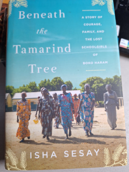 Cover of the book Beneath the Tamarind Tree by Isha Sesay with women walking outdoors