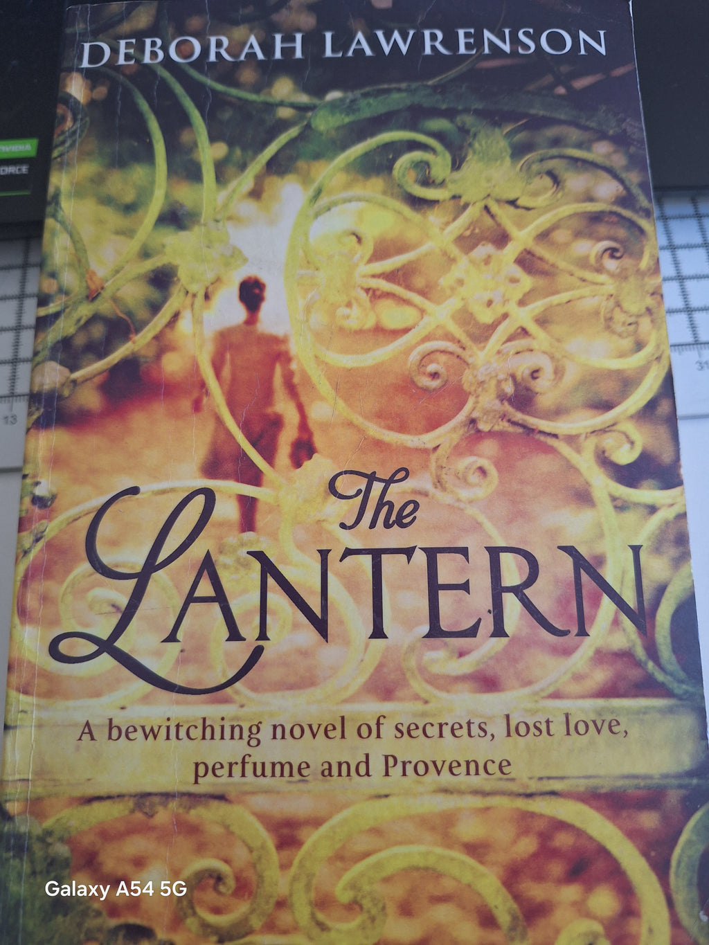The Lantern Deborah Lawrenson used book featuring a captivating cover design and intriguing imagery